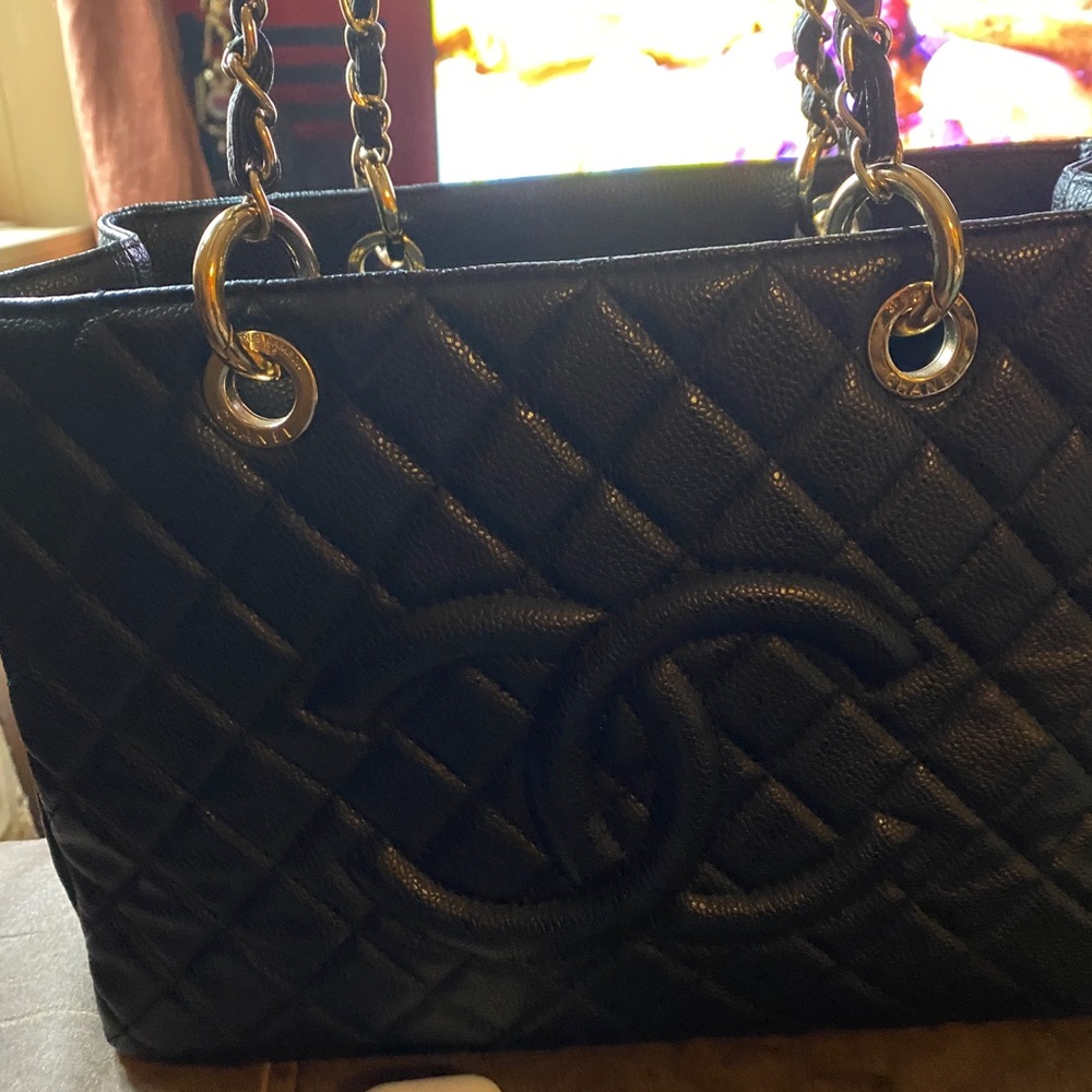 Gold tone qith dust bag like chanel bag